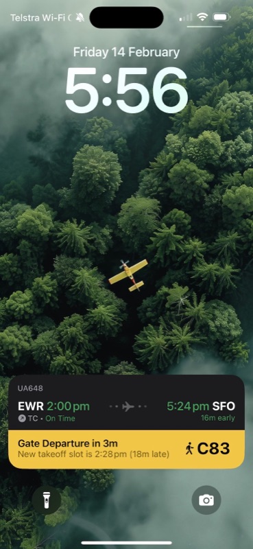 Lock screen live activity: gate departure in 3 minutes, flight on time